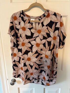 CAbi Black Floral Short-Sleeve Tee with Cream Petals & Rust Centers